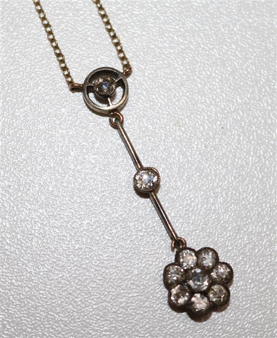 An Edwardian gold, silver and diamond cluster drop pendant necklace, pendant 35mm.
